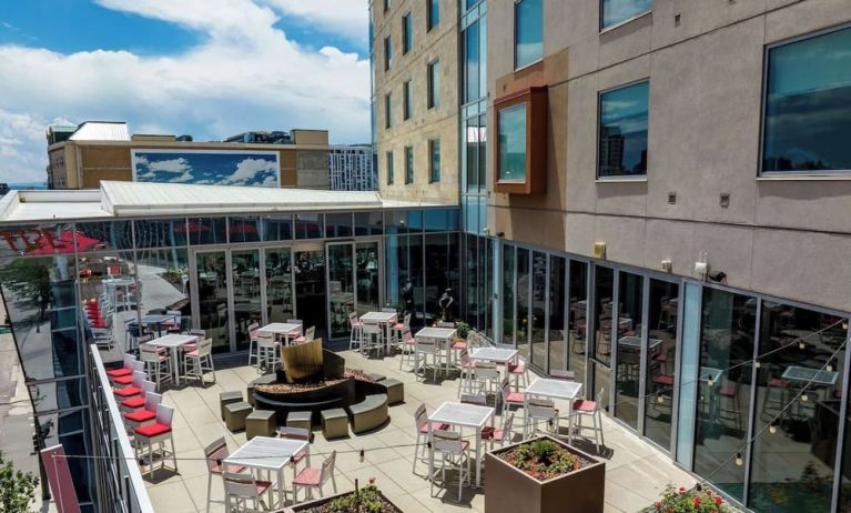 Stunning outdoor lounge and dining space at The Art Hotel Denver.