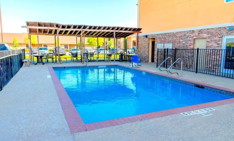 Outdoor pool at Hotel Pearland.