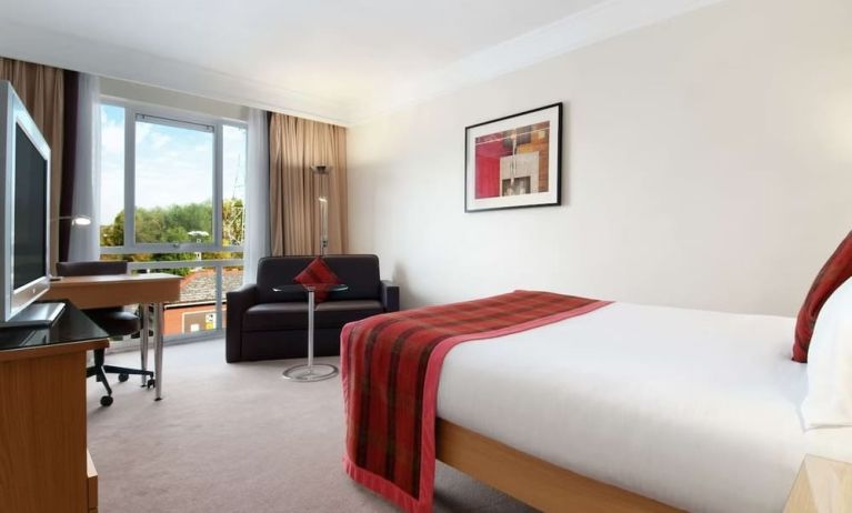 Day use room with TV and work space at Hilton Leicester.