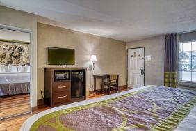 Day use room with TV and mini-fridge at Super 8 By Wyndham Houston/Webster.