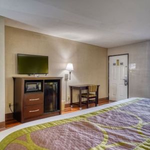 Day use room with TV and mini-fridge at Super 8 By Wyndham Houston/Webster.