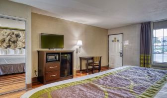 Day use room with TV and mini-fridge at Super 8 By Wyndham Houston/Webster.