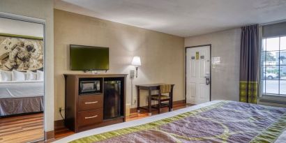 Day use room with TV and mini-fridge at Super 8 By Wyndham Houston/Webster.