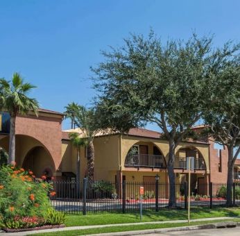 Outdoor garden space at Super 8 By Wyndham Houston/Webster.