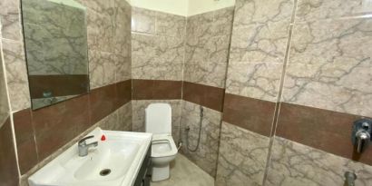 Guest bathroom with shower at Pradhan Stay Sohna Near Bus Stand.