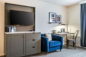 Day use room with TV and work space at EnVision Hotel St. Paul South.