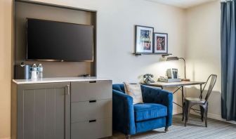 Day use room with TV and work space at EnVision Hotel St. Paul South.