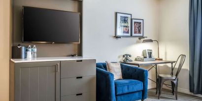 Day use room with TV and work space at EnVision Hotel St. Paul South.