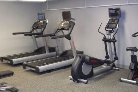 Fitness center at EnVision Hotel And Conference Center Mansfield Foxboro.