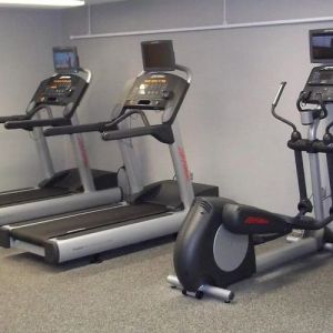 Fitness center at EnVision Hotel And Conference Center Mansfield Foxboro.