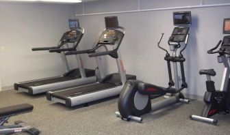 Fitness center at EnVision Hotel And Conference Center Mansfield Foxboro.