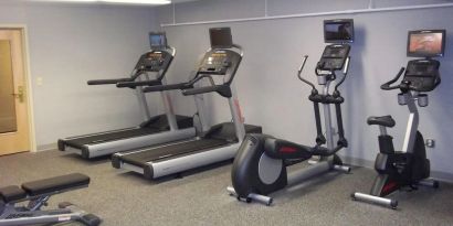 Fitness center at EnVision Hotel And Conference Center Mansfield Foxboro.