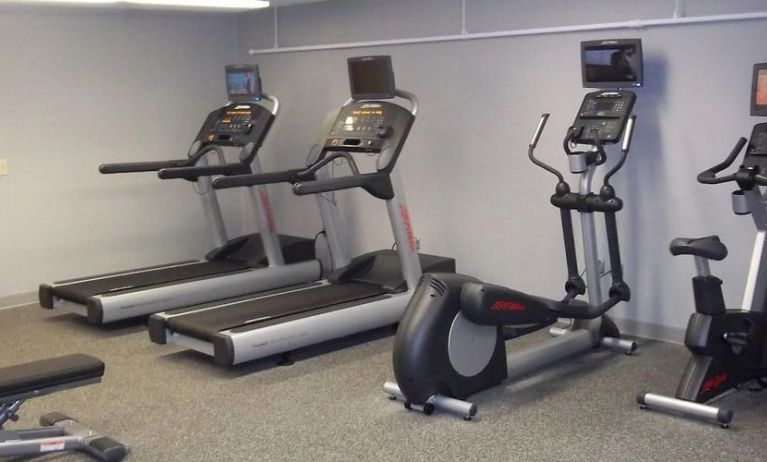 Fitness center at EnVision Hotel And Conference Center Mansfield Foxboro.