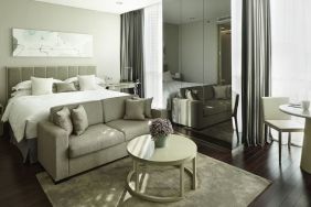 Spacious king room with lounge at Fraser Residence Menteng Jakarta.