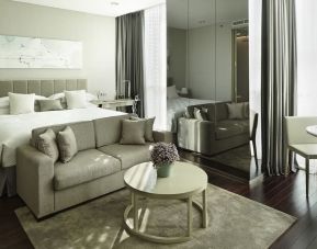 Spacious king room with lounge at Fraser Residence Menteng Jakarta.