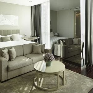 Spacious king room with lounge at Fraser Residence Menteng Jakarta.