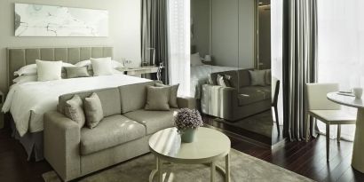 Spacious king room with lounge at Fraser Residence Menteng Jakarta.