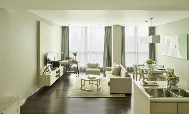 Spacious day room with kitchen and lounge at Fraser Residence Menteng Jakarta.