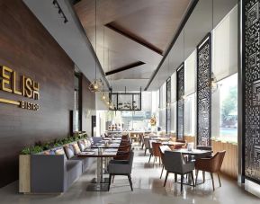 Dining and coworking area at Fraser Residence Menteng Jakarta.