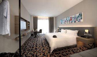 Delux king room with TV and natural light at Capri By Fraser Johor Bahru.