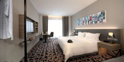 Delux king room with TV and natural light at Capri By Fraser Johor Bahru.