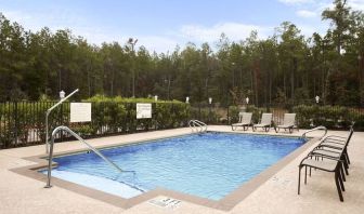 Relaxing outdoor pool at Hampton Inn & Suites Conroe - I-45 North.