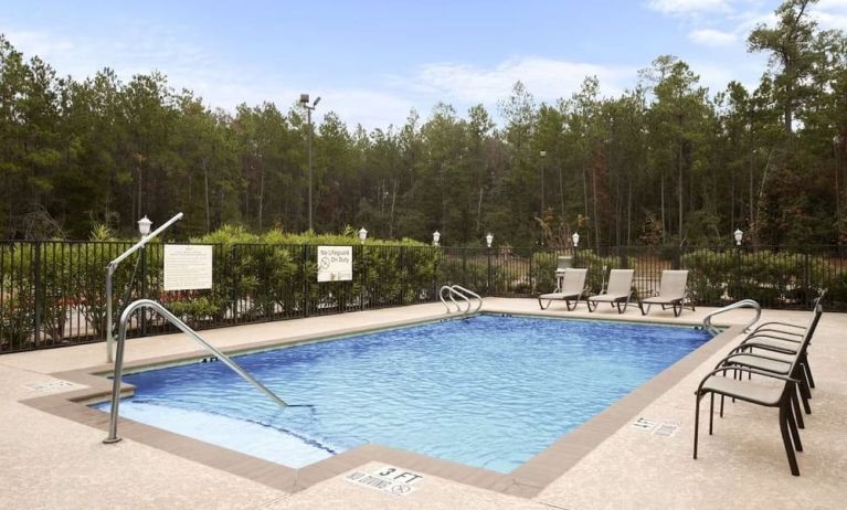 Relaxing outdoor pool at Hampton Inn & Suites Conroe - I-45 North.