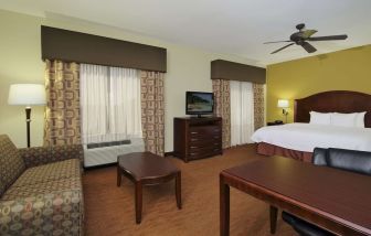 King room with TV and ceiling fan at Hampton Inn & Suites Conroe - I-45 North.