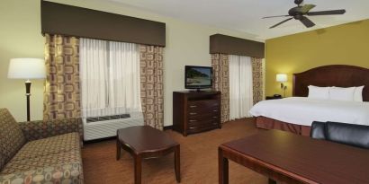 King room with TV and ceiling fan at Hampton Inn & Suites Conroe - I-45 North.