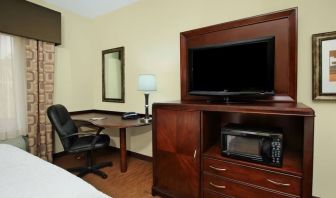 Day use room with TV and work area at Hampton Inn & Suites Conroe - I-45 North.