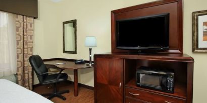 Day use room with TV and work area at Hampton Inn & Suites Conroe - I-45 North.