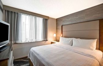 Day use room with TV at Homewood Suites By Hilton Chicago-Downtown.