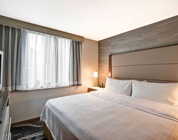 Day use room with TV at Homewood Suites By Hilton Chicago-Downtown.