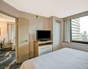 Day room with TV at Homewood Suites By Hilton Chicago-Downtown.