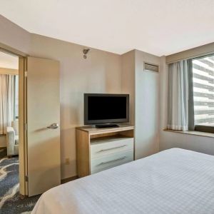 Day room with TV at Homewood Suites By Hilton Chicago-Downtown.