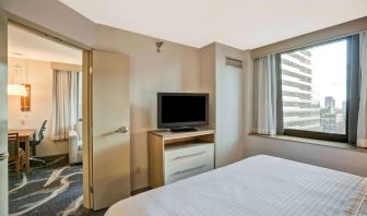 Day room with TV at Homewood Suites By Hilton Chicago-Downtown.