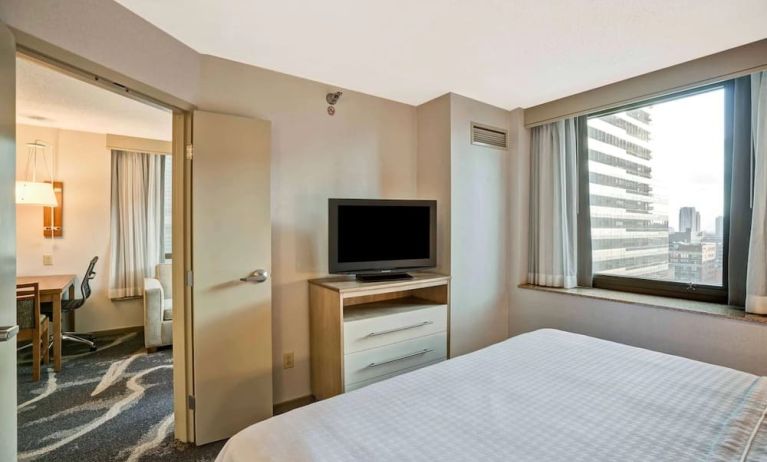 Day room with TV at Homewood Suites By Hilton Chicago-Downtown.