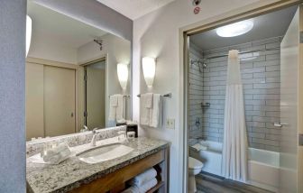 Private bathroom at Homewood Suites By Hilton Chicago-Downtown.