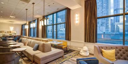 Lounge and coworking space at Homewood Suites By Hilton Chicago-Downtown.