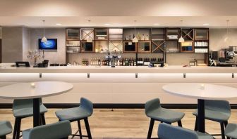 Bar and lounge area at Hampton By Hilton London Stansted Airport.