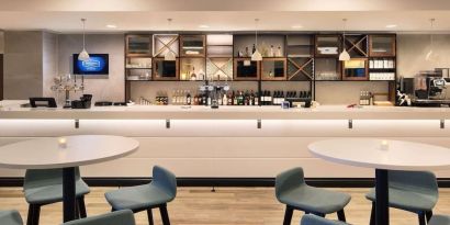 Bar and lounge area at Hampton By Hilton London Stansted Airport.