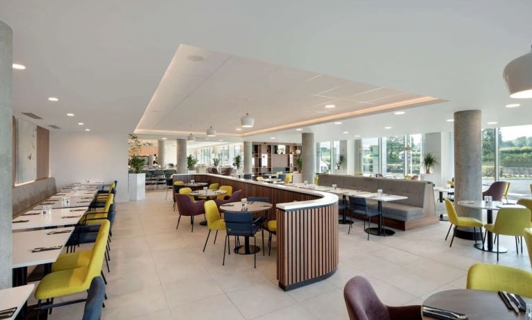 Lounge and coworking space at Hampton By Hilton London Stansted Airport.