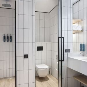 Guest bathroom with shower at Hilton Garden Inn Tbilisi Riverview.