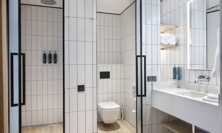 Guest bathroom with shower at Hilton Garden Inn Tbilisi Riverview.