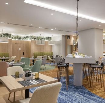 Lounge and lobby area at Hilton Garden Inn Tbilisi Riverview.