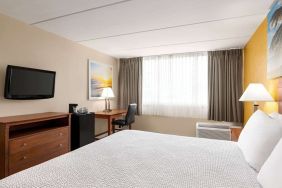 Day use room with TV and work space at Days Inn Miami International Airport,