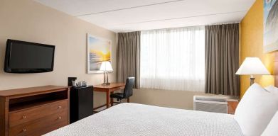 Day use room with TV and work space at Days Inn Miami International Airport,