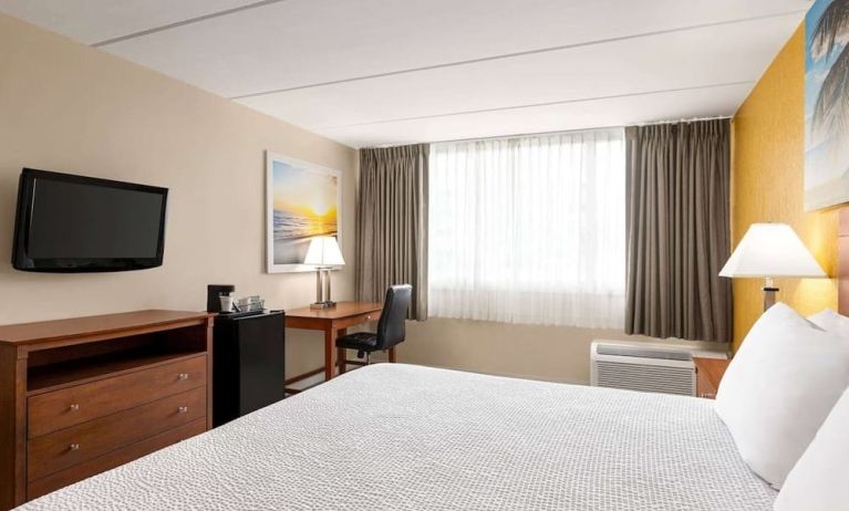 Day use room with TV and work space at Days Inn Miami International Airport,