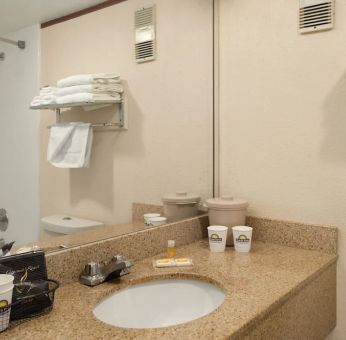 Private guest bathroom at Days Inn Miami International Airport,