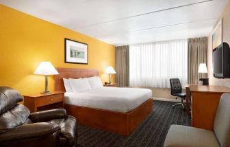 Spacious king room with work desk at Days Inn Miami International Airport,